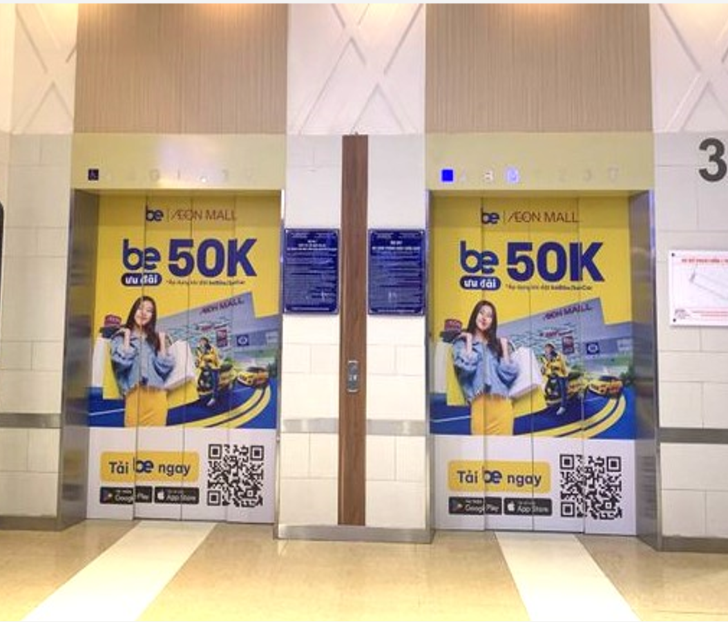 Quảng cáo dán cửa thang máy tại AEON Mall